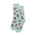 Pair of light blue crew socks with a pattern of various small dogs carrying sticks.  The dogs are in shades of brown, black, and white.