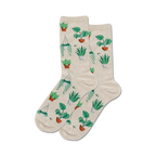 Pair of beige crew socks with a pattern of various green potted plants and small bees. 