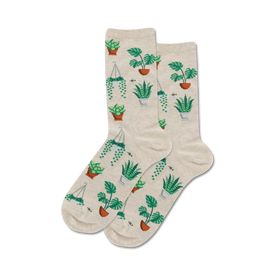 white crew socks with a pattern of potted plants in green, white, and brown. bees are also featured on the socks.   