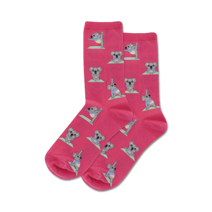 pink crew socks for women featuring a fun pattern of cartoon koalas doing yoga.   