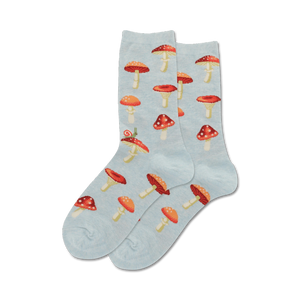 womens crew socks feature an allover pattern of red mushrooms with white spots and a snail on one of the socks  