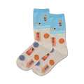 Pair of cream crew socks with a beach theme. Light blue tops show swimmers. The socks feature sunbathers, beach umbrellas, and red, blue, and yellow accents.