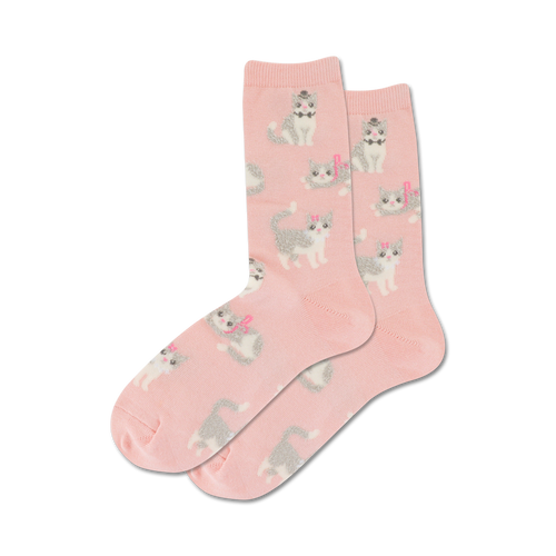 Close-up of a pair of pink crew socks featuring a pattern of gray kittens with pink bows.
