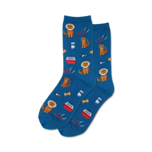 Pair of teal blue crew socks with a fun pattern of cats and dogs in medical imagery: stethoscopes, pet carriers, and syringes.