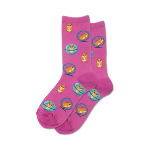 pink novelty crew socks feature a pattern of hamsters running in blue hamster wheels.   