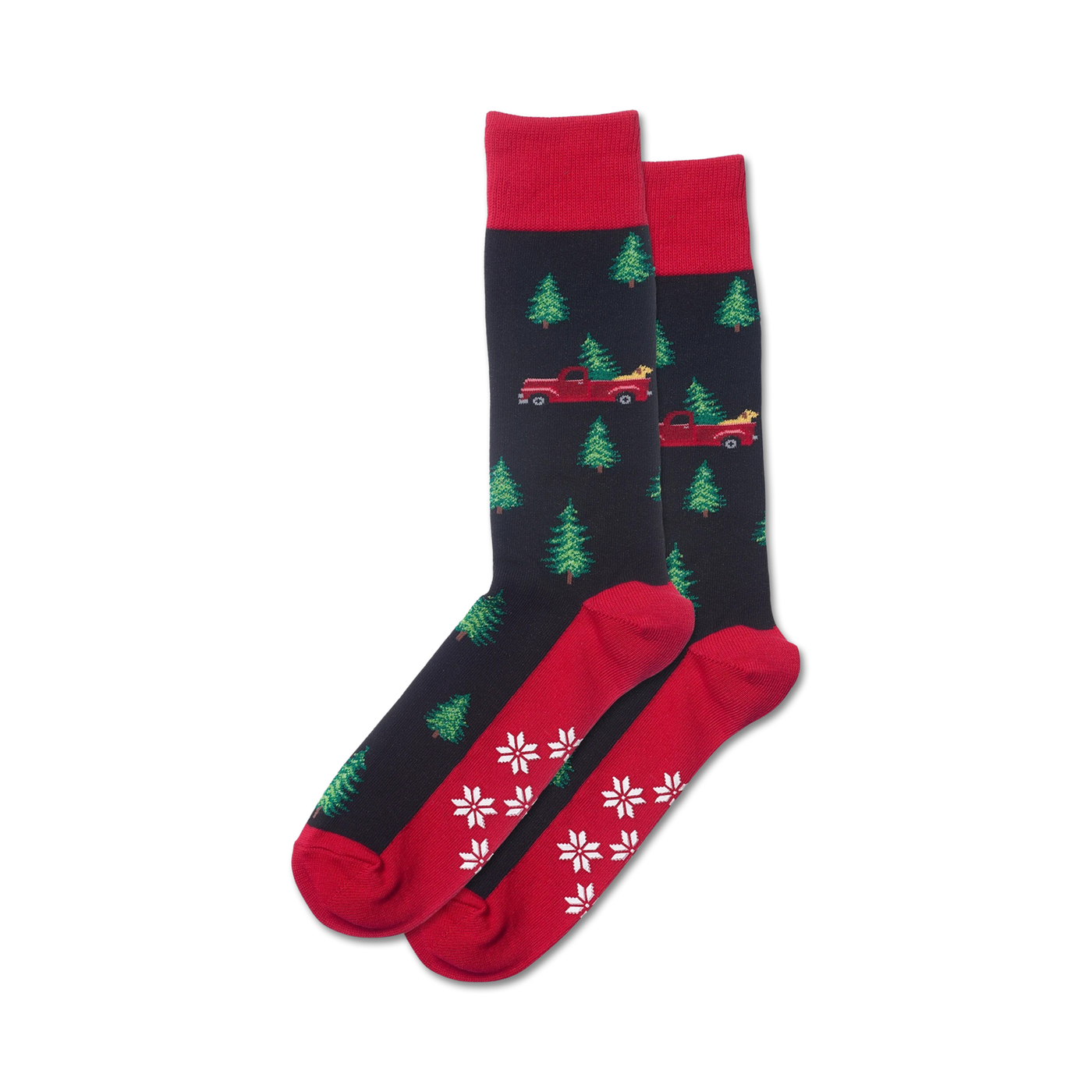 Pair of crew socks in navy and red, featuring a pattern of red trucks carrying Christmas trees and snowflakes on the bottom.