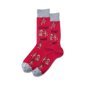 mens red crew socks with gray toes, heels, and cuffs feature a row of gingerbread people in various poses. text on sock reads "let's get baked."  