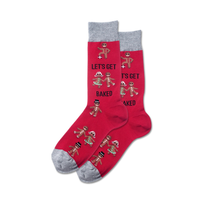 mens red crew socks with gray toes, heels, and cuffs feature a row of gingerbread people in various poses. text on sock reads "let's get baked."  