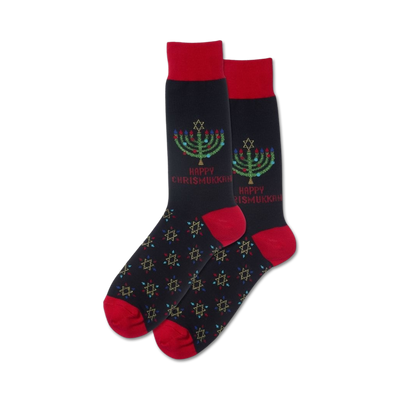 black crew socks with red cuffs and toes featuring a multi-colored menorah and star of david pattern with the words "happy chrismukkah" knit in.   