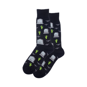 Pair of navy crew socks with a Halloween design. The pattern includes cartoon gravestones, zombie hands, and bats.