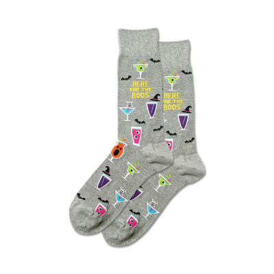  men's crew socks with halloween-themed pattern of martini glasses, bats, skulls, and pumpkins.   