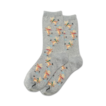  women's gray crew socks feature a pattern of ice skating reindeer wearing red and green scarves on a light blue background.  