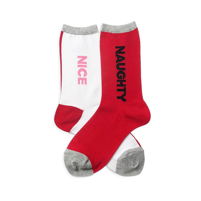 Pair of Naughty and Nice crew socks. One red sock says 'NAUGHTY' in black, the other white sock says 'NICE' in pink. Both hav