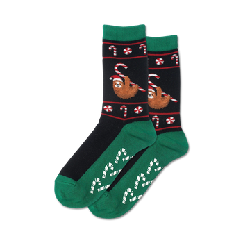 christmas sloth non-skid slipper socks - women's crew socks, black with green sole and cuff, sloth and candy cane pattern.   