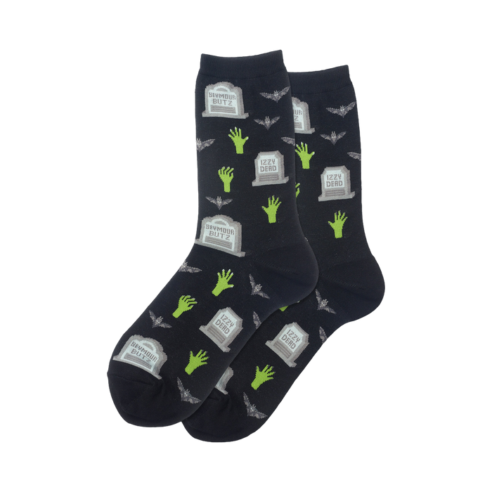Pair of dark crew socks featuring a pattern of gray gravestones, lime green zombie hands, and small bats. }}
