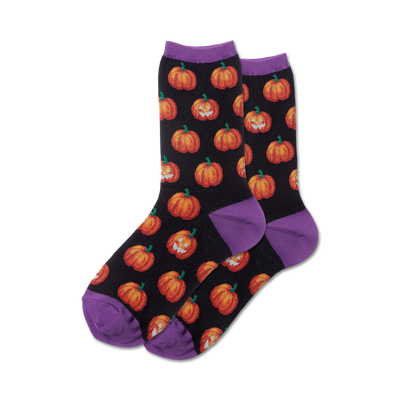 black crew socks with orange glow in the dark carved face pumpkin pattern; womens.   