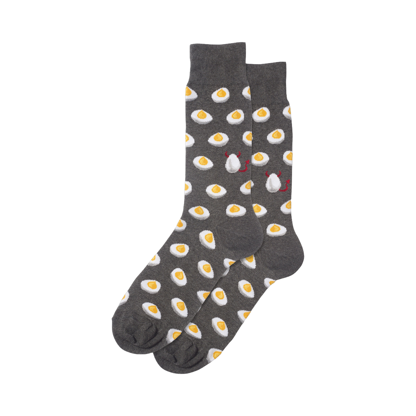 A pair of dark gray crew socks with a repeating pattern of yellow deviled eggs. Two eggs have small red devil horns and tails.