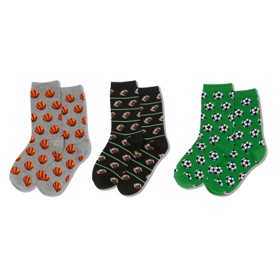Three pairs of crew socks. Left: grey with orange basketballs. Middle: black with brown footballs, green lines. Right: green with soccer balls.