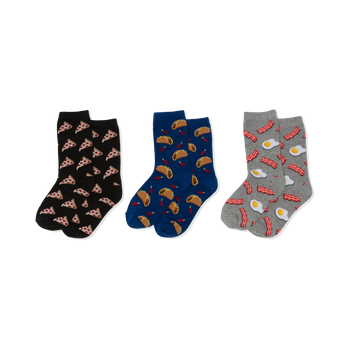 Three pairs of crew socks, folded: black with pizza, blue with tacos and chili peppers, grey with bacon and fried eggs.