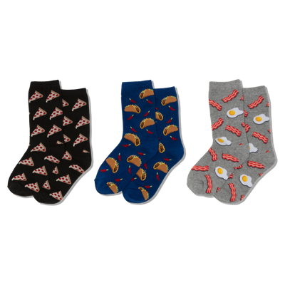 Three pairs of crew socks, folded: black with pizza, blue with tacos and chili peppers, grey with bacon and fried eggs.