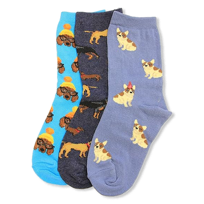 Three pairs of crew socks: blue with poodles in beanies, dark blue with dachshunds, lavender with corgi-like dogs.