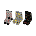 Three pairs of crew socks: light gray with red cars, gray with yellow emojis, black with colorful skateboarders, all with black accents.