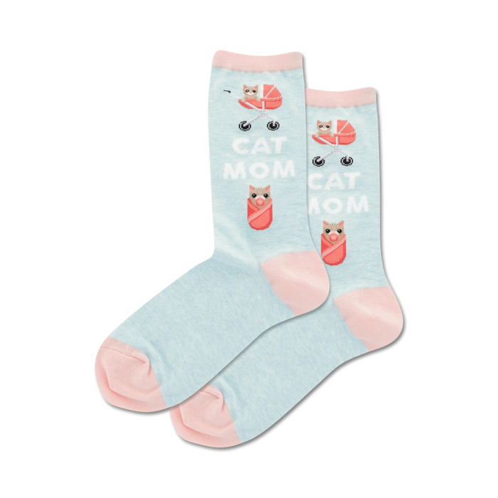 light blue crew socks with pink toe, heel, and cuff. pattern of cats pushing baby strollers with 