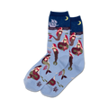 Pair of women's crew socks in light blue featuring red-haired mermaids, coral, starfish, and a sailing ship at night.