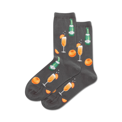 women's gray crew socks feature an allover pattern of green champagne bottles, orange slices, and mimosa cocktails.  