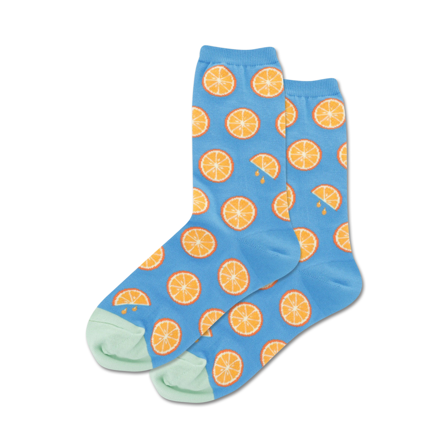 Lifestyle shot of a person wearing the orange citrus socks, showing them styled with a summery outfit.