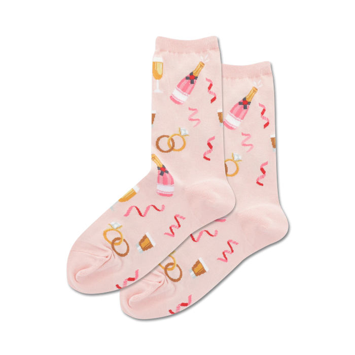 pink crew socks with champagne flutes, wedding rings, and ribbons.  