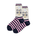 Pair of women's crew socks. Pink and navy blue stripes, with a cream-colored section that says 'Nauti Bride' with an anchor and life preserver.
