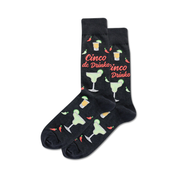 black crew socks feature a pattern of cinco de drinko, margaritas, and chili peppers.   
