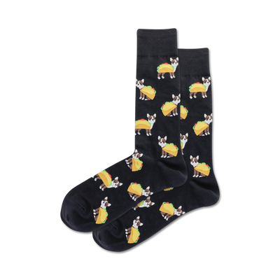 taco terrier crew socks: black socks with an illustrated pattern featuring cartoon tacos being worn as ponchos by terrier dogs.  