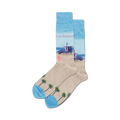 Pair of crew socks showcasing a beach scene: light beige with palm trees at the bottom, a lifeguard tower, and a light blue ocean. 'Los Angeles' text is subtly included.
