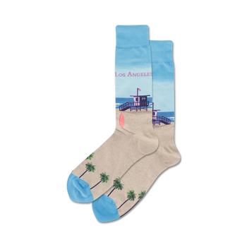 crew-length socks with a palm tree and lifeguard tower pattern in light blue, dark blue, tan, and pink for men who love the beach.   