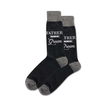 mens black crew socks with gray toes, heels, and ribbed cuffs. text on socks reads "father of the groom" when worn together. perfect for weddings.   