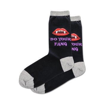 women's do your fang crew sock features a pattern of red vampire lips and sharp white fangs.   