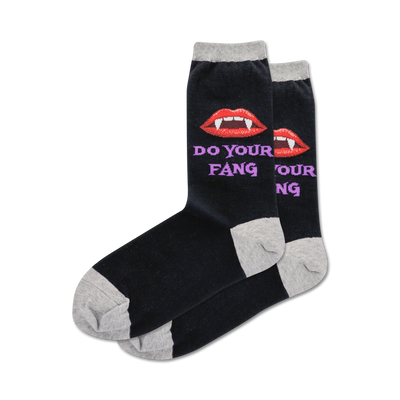 women's do your fang crew sock features a pattern of red vampire lips and sharp white fangs.   