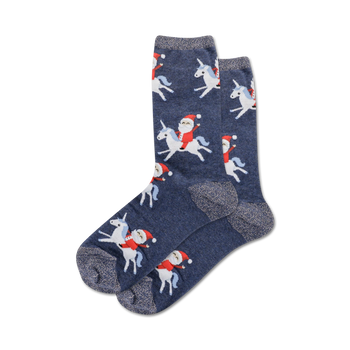 dark blue crew socks with all-over pattern of santa claus riding a white unicorn with a pink mane and tail, and snowflakes.  