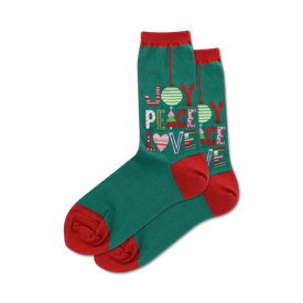 womens green crew socks with red and white "joy. peace. love" text, red hearts, and green christmas trees.  