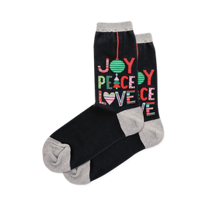 Black crew socks with grey cuffs, heels & toes, printed with colorful 'JOY PEACE LOVE' holiday text & symbols.