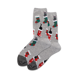 women's crew socks in gray with a pattern of black cats wearing red and green stockings with white cuffs and white stars.  