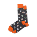 Pair of grey crew socks with orange cuffs and a repeating eyeball pattern. The eyeballs are multicolored with black pupils.