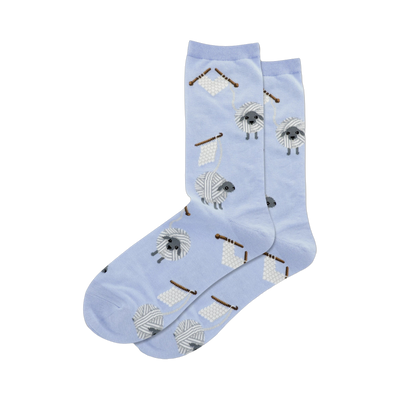Pair of light blue crew socks with a repeating pattern of gray sheep tangled in yarn balls and knitting needles.