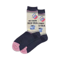 Cream-colored crew socks with navy blue feet and pink toes. Features a repeating pattern of teapots, teacups, and the phrase 'Hey There HOT-TEA'.