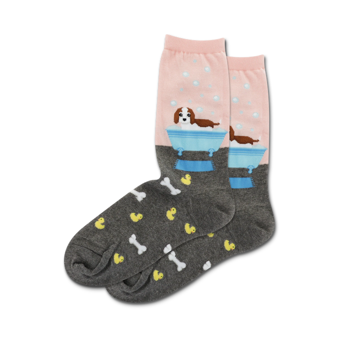 womens crew socks with dog print, pink and gray. cartoon dogs take a bath in a blue bathtub surrounded by rubber ducks, bubbles, and bones.   