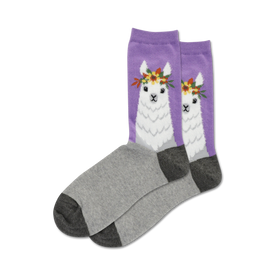 purple socks with gray toe, heel, and cuff feature a white llama with a flower crown. crew length womens socks.   