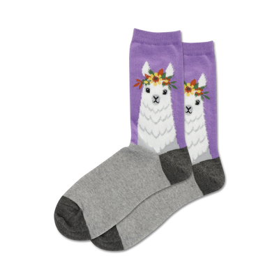 purple socks with gray toe, heel, and cuff feature a white llama with a flower crown. crew length womens socks.   