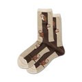 Pair of cream and brown crew socks featuring repeating illustrations of barn owls perched on branches.